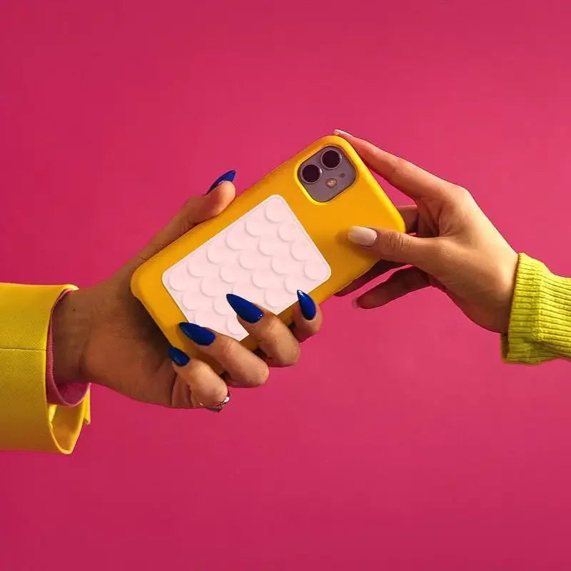 Magic Grip Phone Mat š§² Anti-Slip Silicone Pad - Sticks to ANY Surface!"