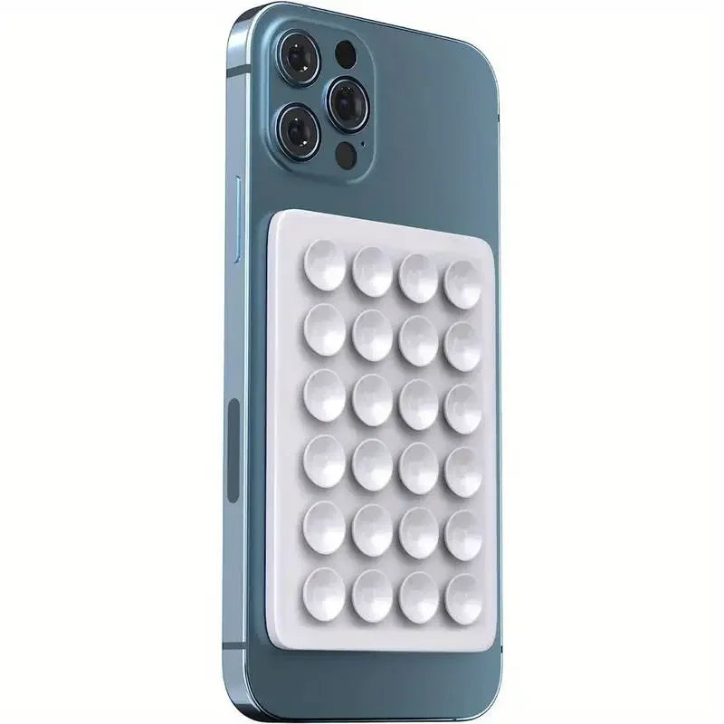 Magic Grip Phone Mat 🧲 Anti-Slip Silicone Pad - Sticks to ANY Surface!"